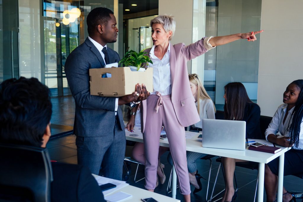 Boss dismisses employee with box