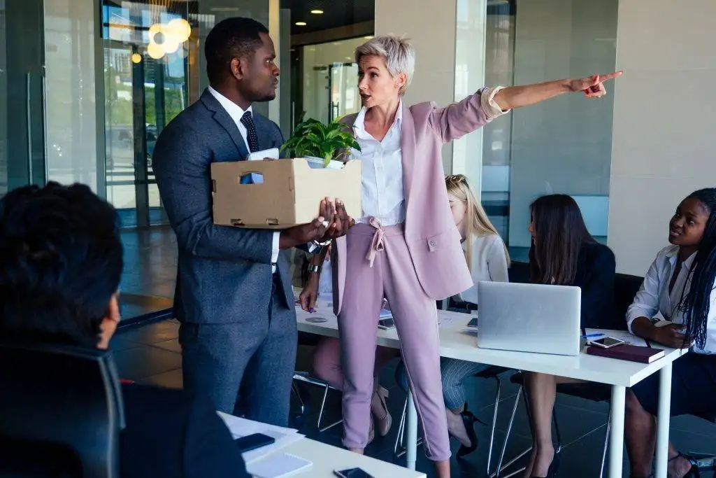 Boss dismisses employee with box