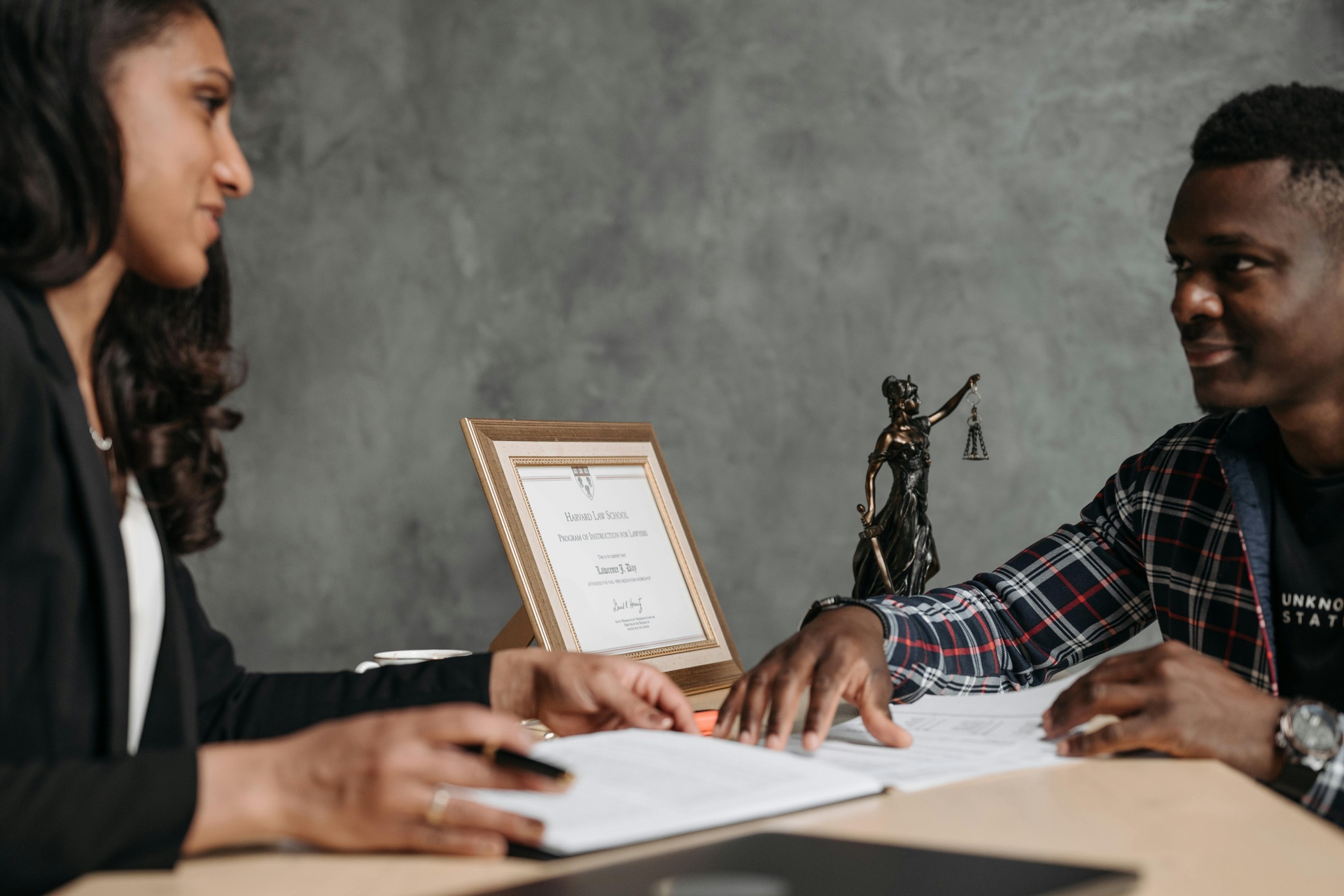 Lawyer and client discussing legal documents