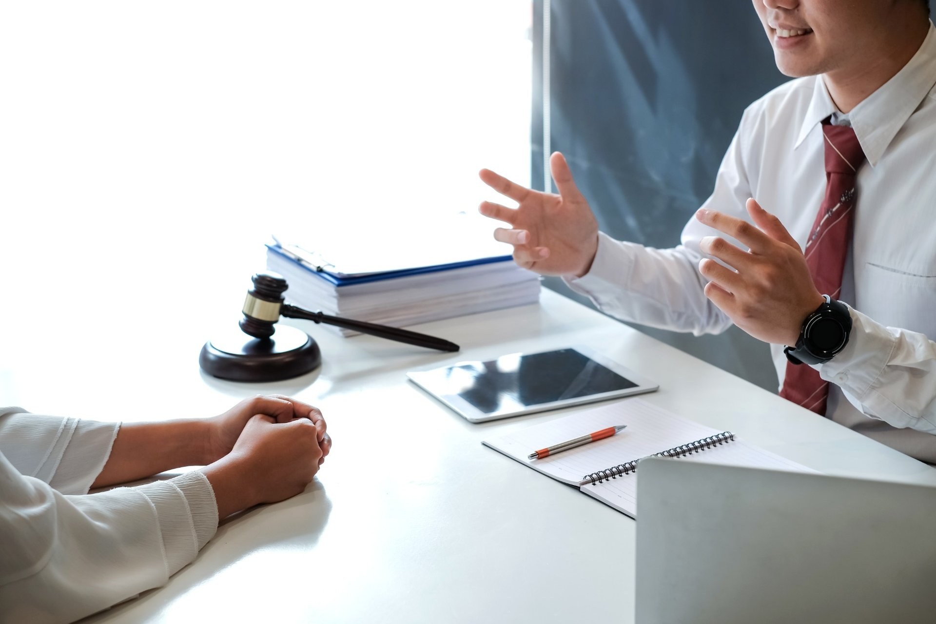 Lawyer explaining legal procedures during client consultation