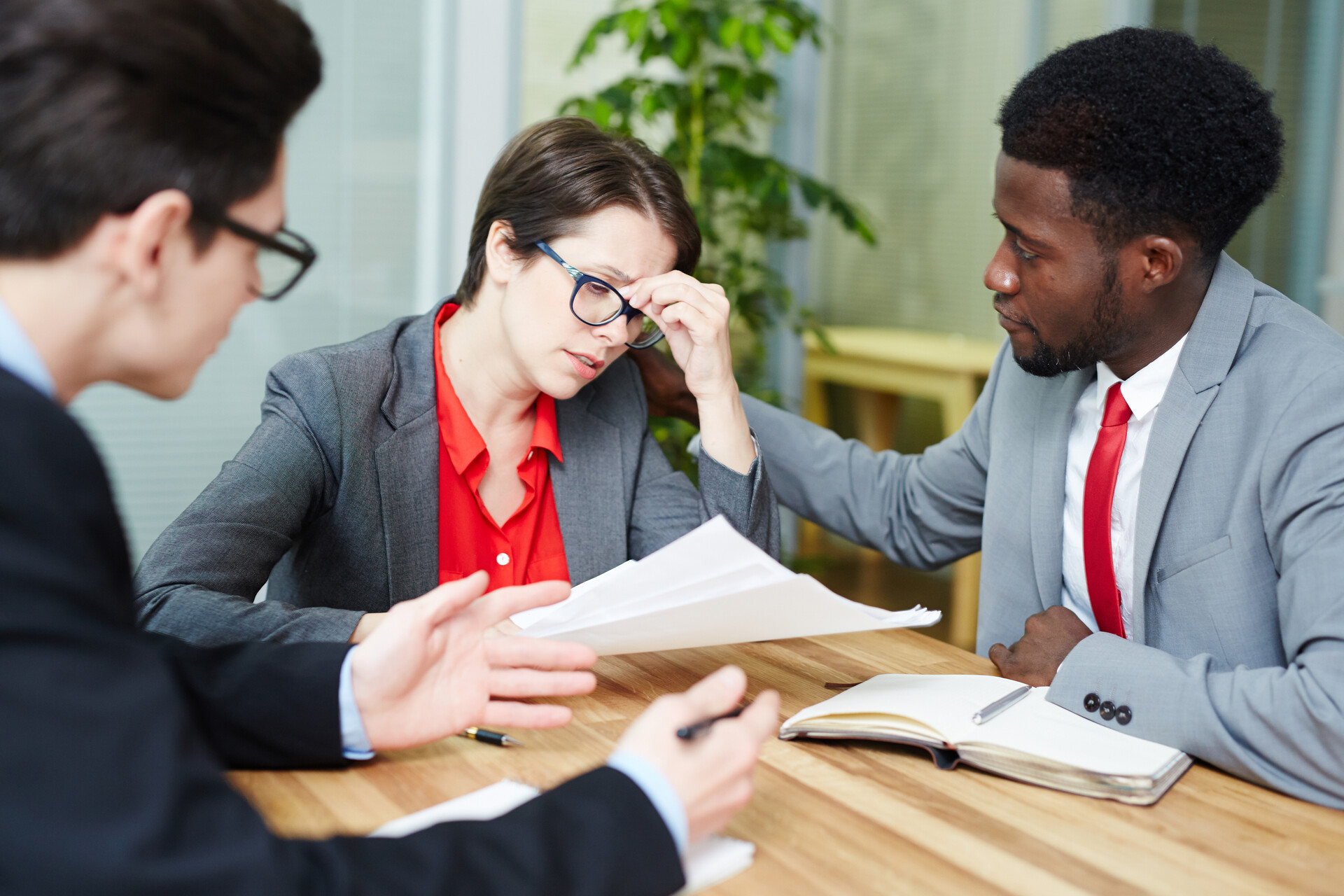 Stressed woman getting support during discussion