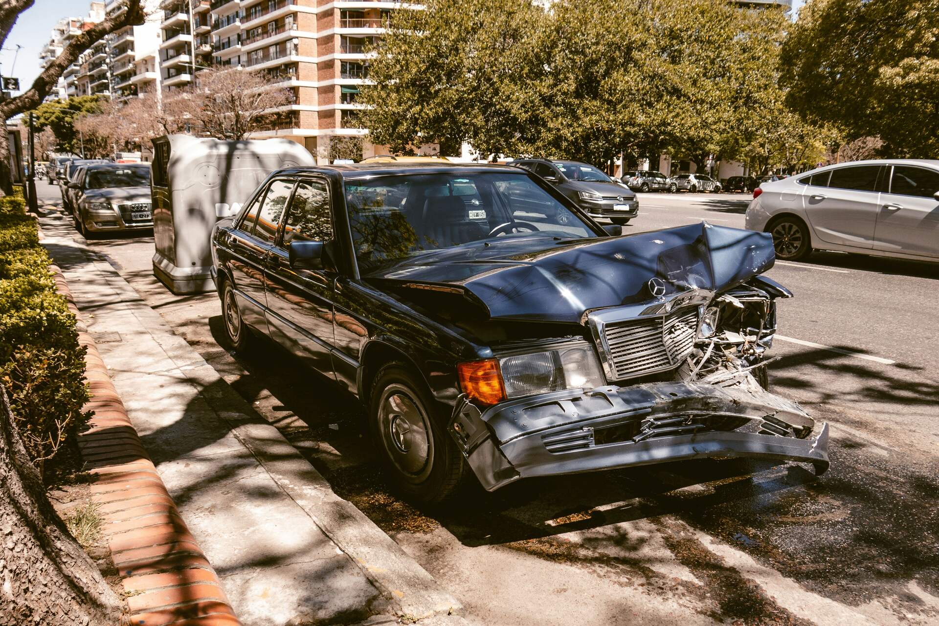 a Mercedes with front-end damage
