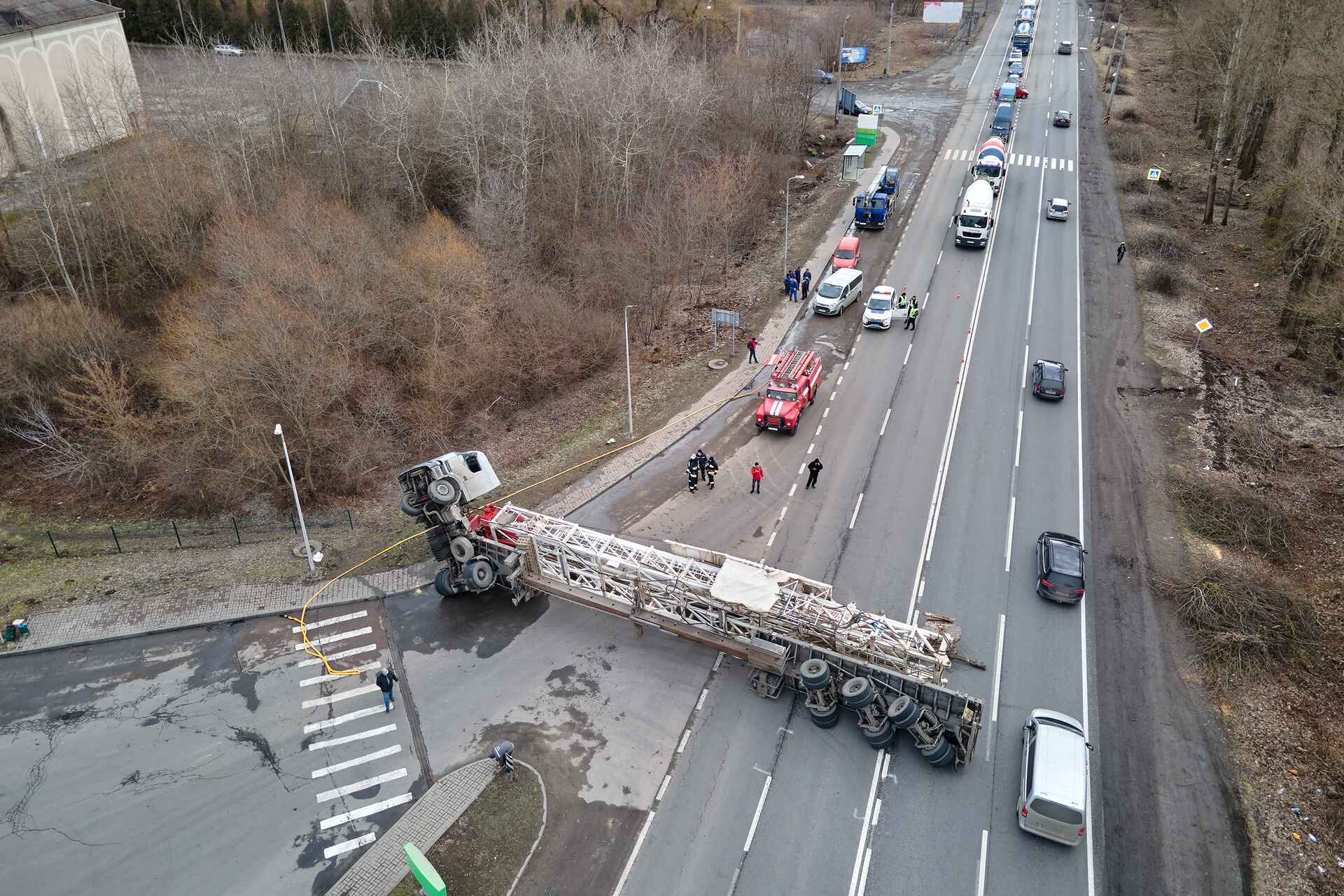 aerial view of road accident with overturned truck