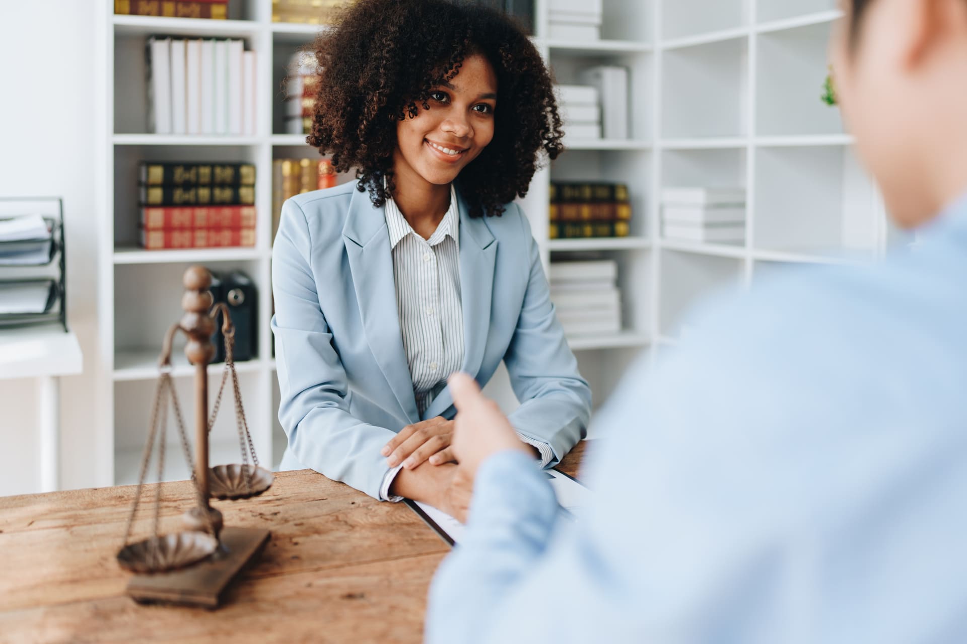 Female attorney speaking to client