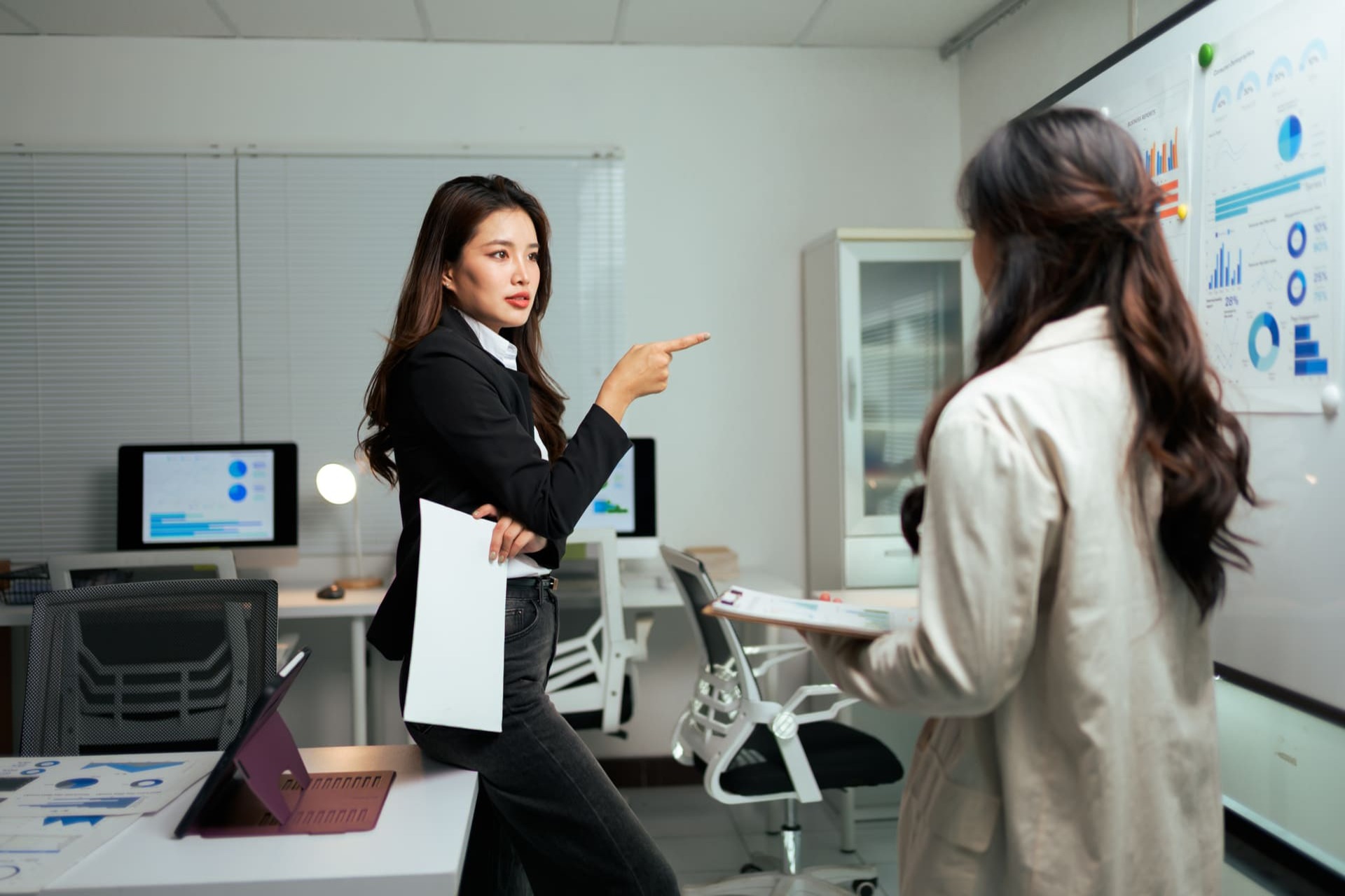 Businesswomen talking at work