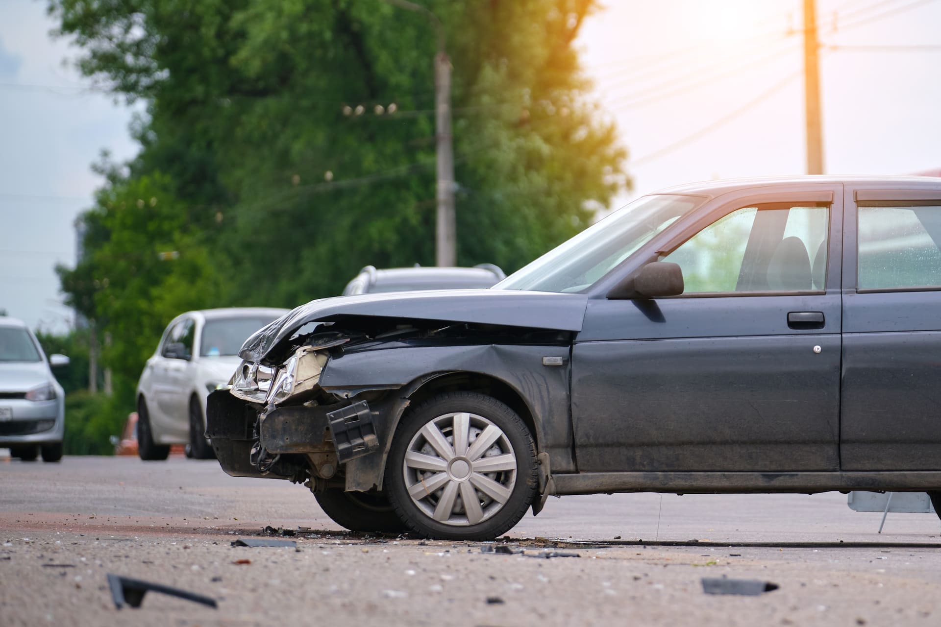 damaged in car accident on city street
