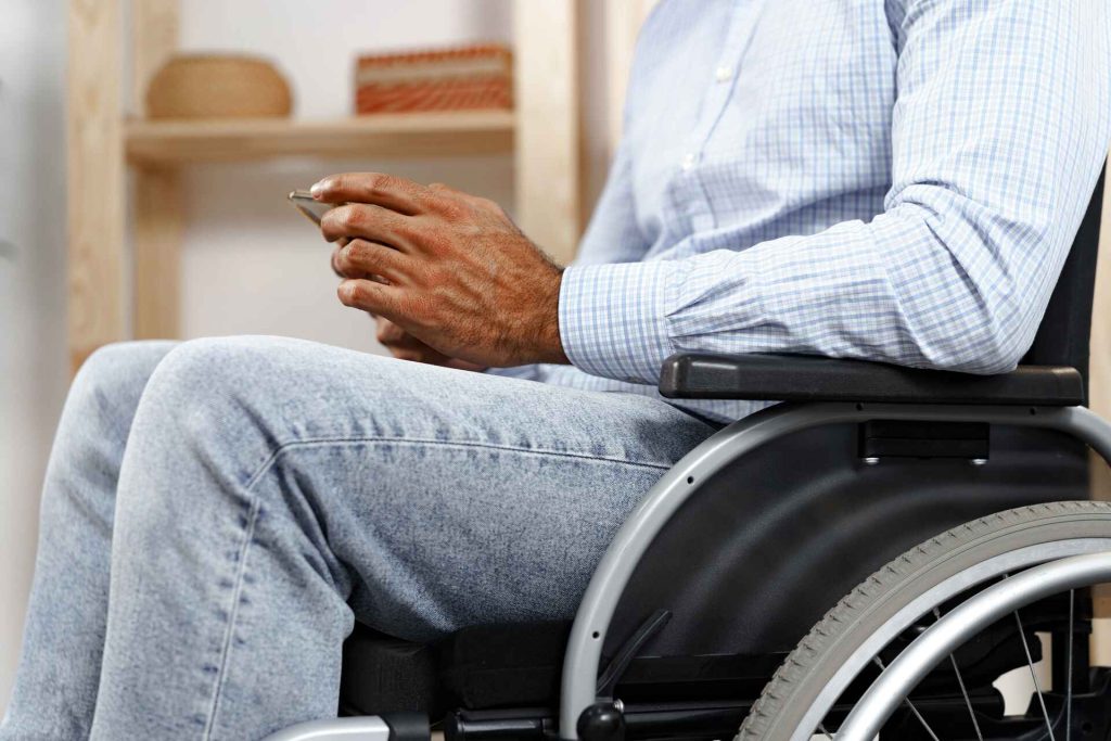 disabled man sitting in a wheelchair