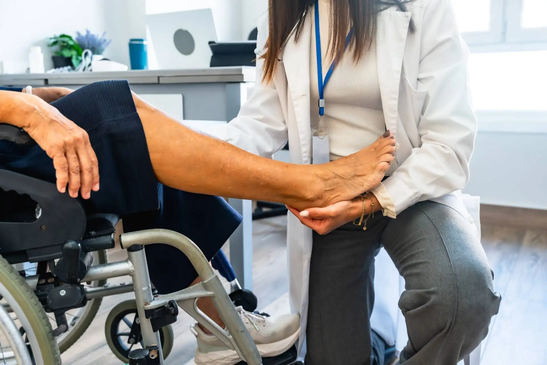 Doctor Examining Patient's Leg