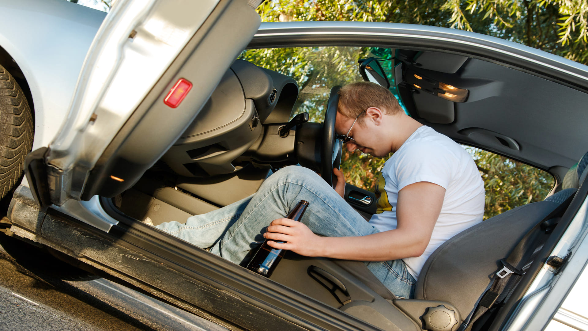 Man in car after DUI accident