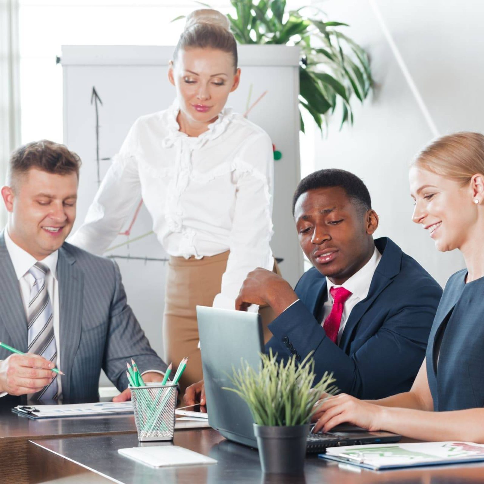 Coworkers at workspace over table