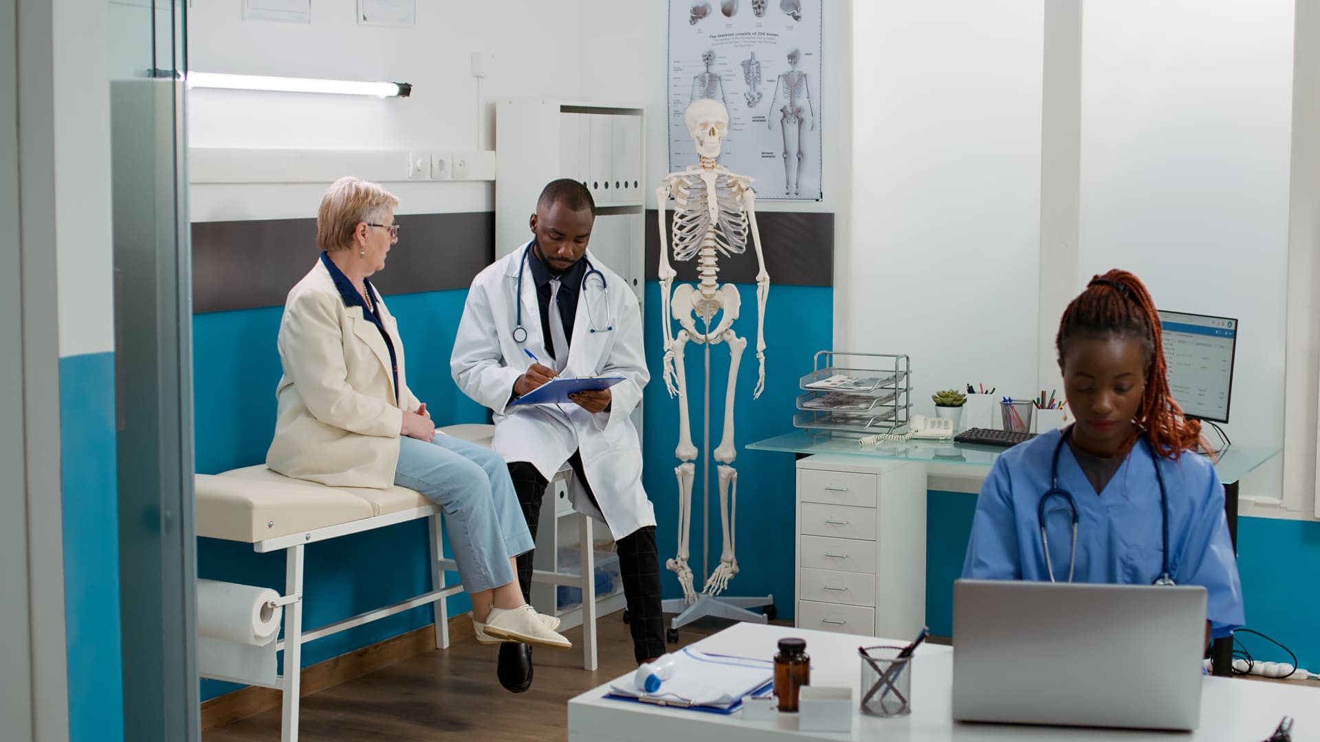 Doctor talking to patient at practice