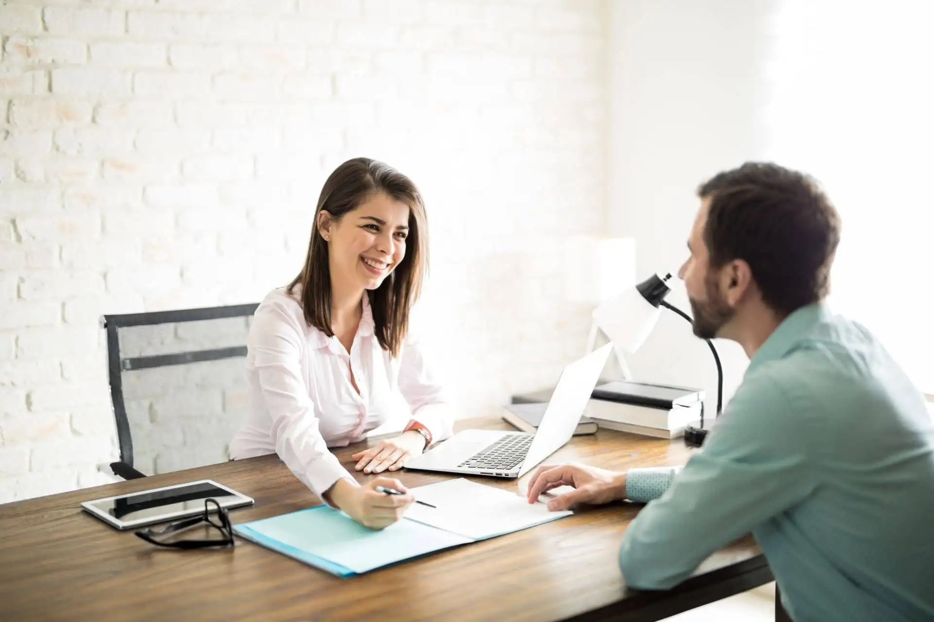insurance agent speaking with client