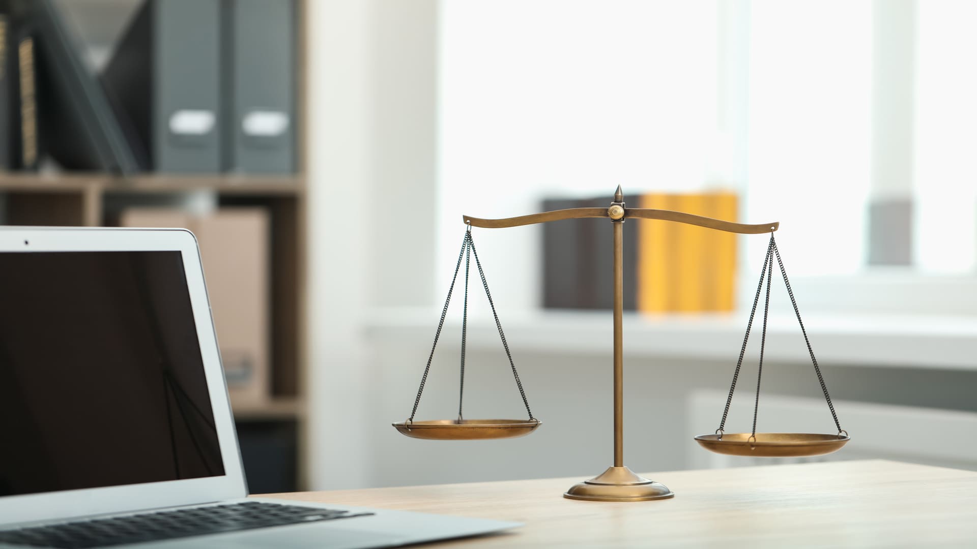 illustration of judge's workplace with the scales of justice