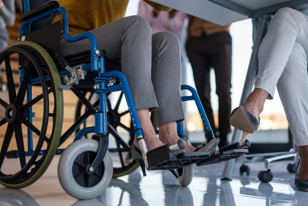 multiracial coworkers analyzing charts and working