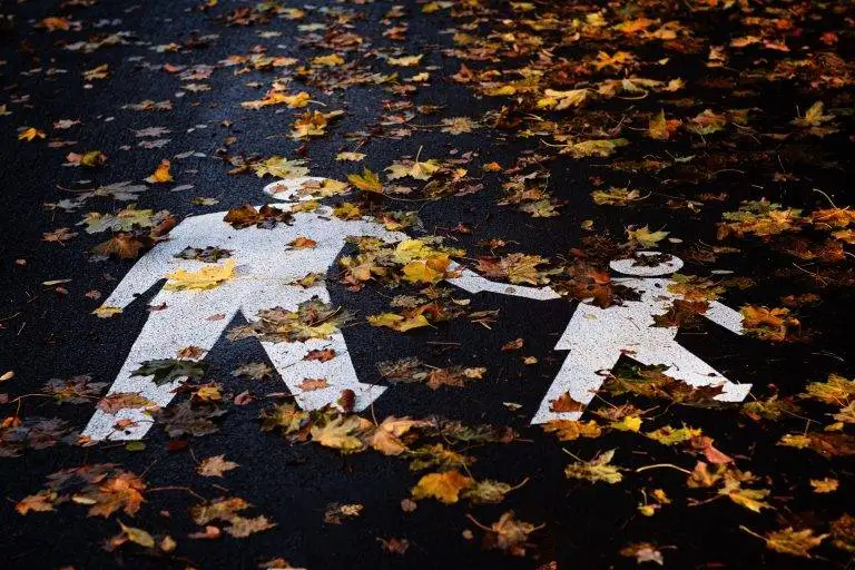 Sign for pedestrians on a sidewalk