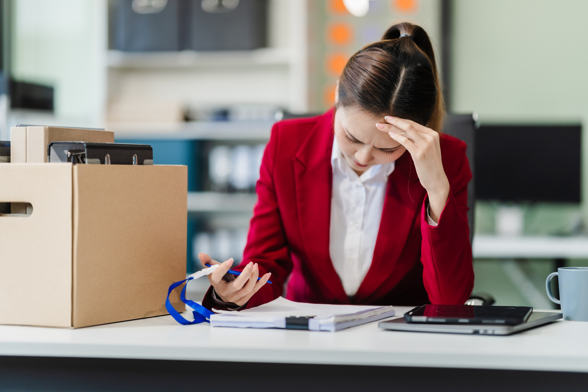 woman signs her termination